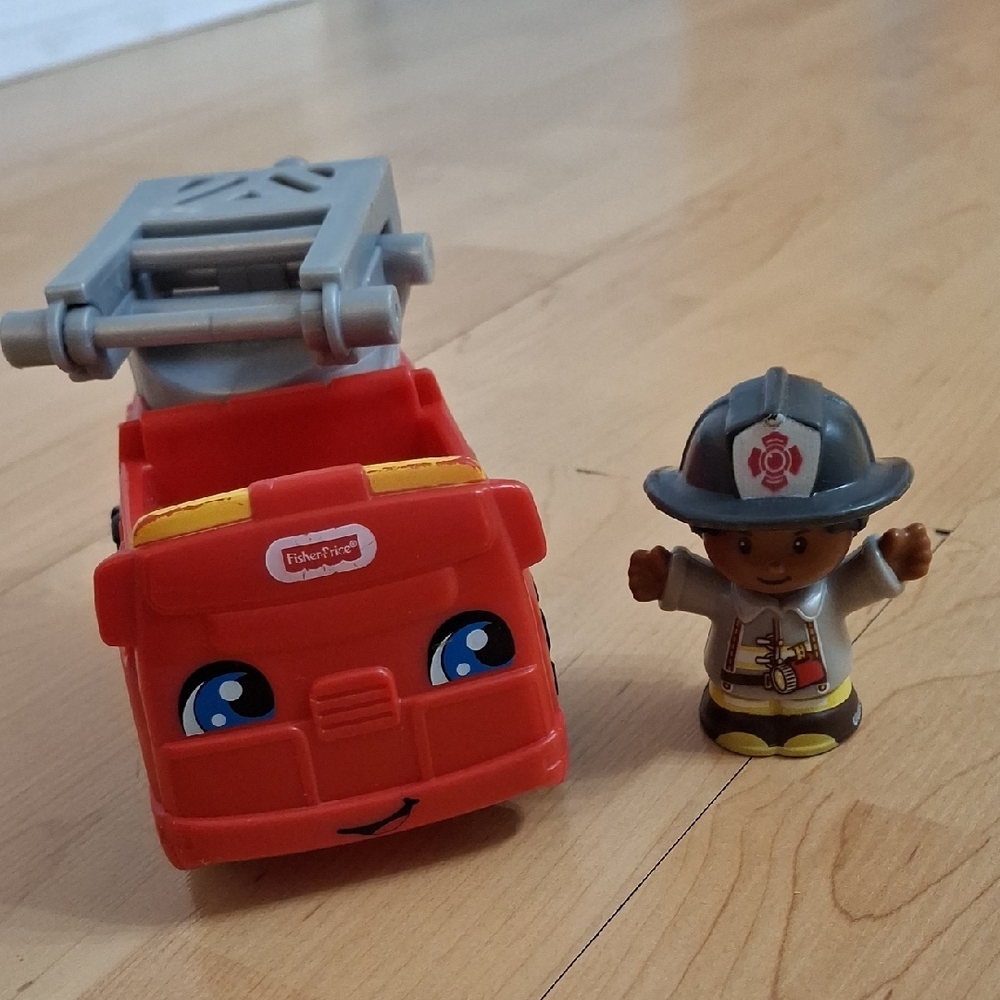 Fisher-Price Smiling Red Fire Truck with Firefighter